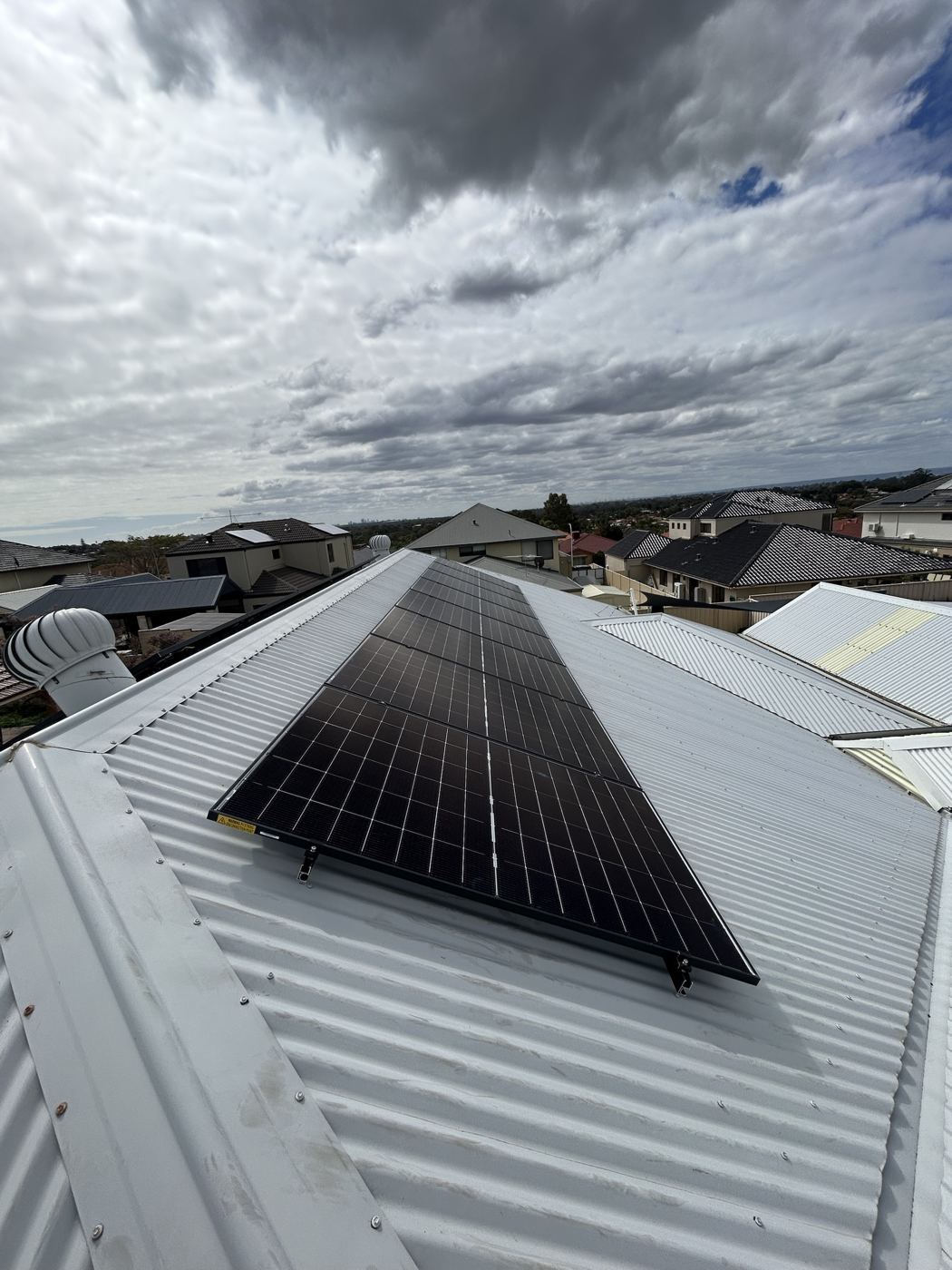 Solar panels installed on a metal roof