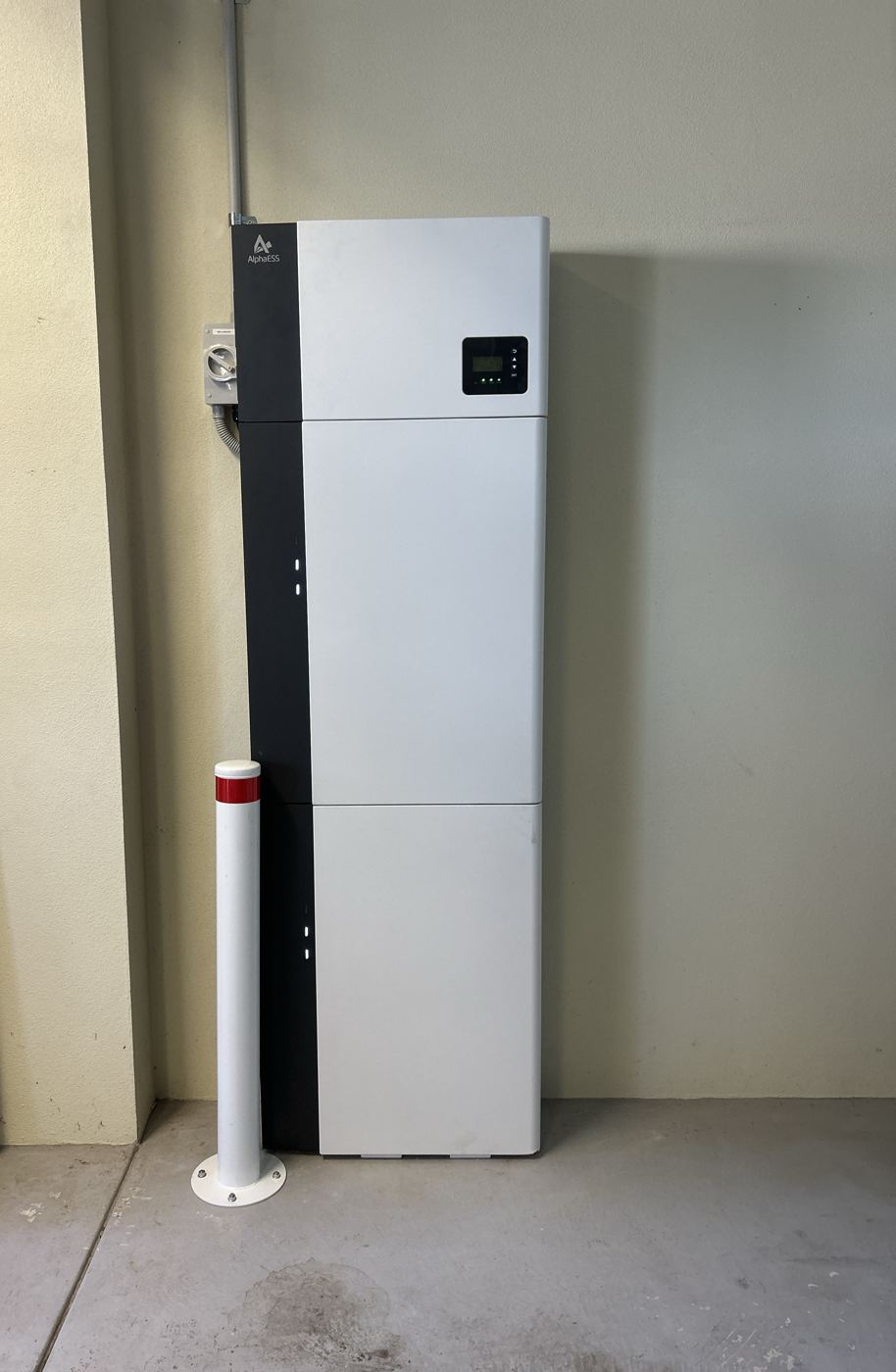 Alpha ESS battery stack with bollard