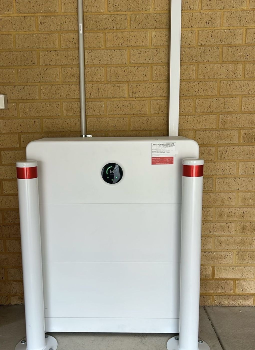 GoodWe battery protected by two bollards